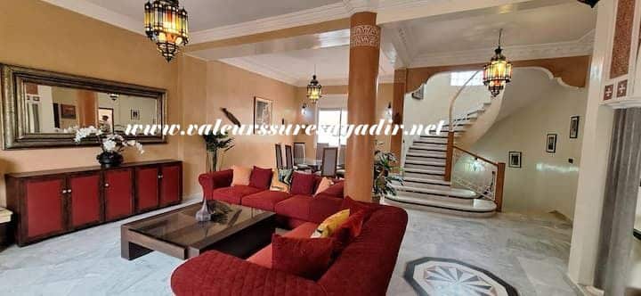 Spacious villa with swimming pool near the beach